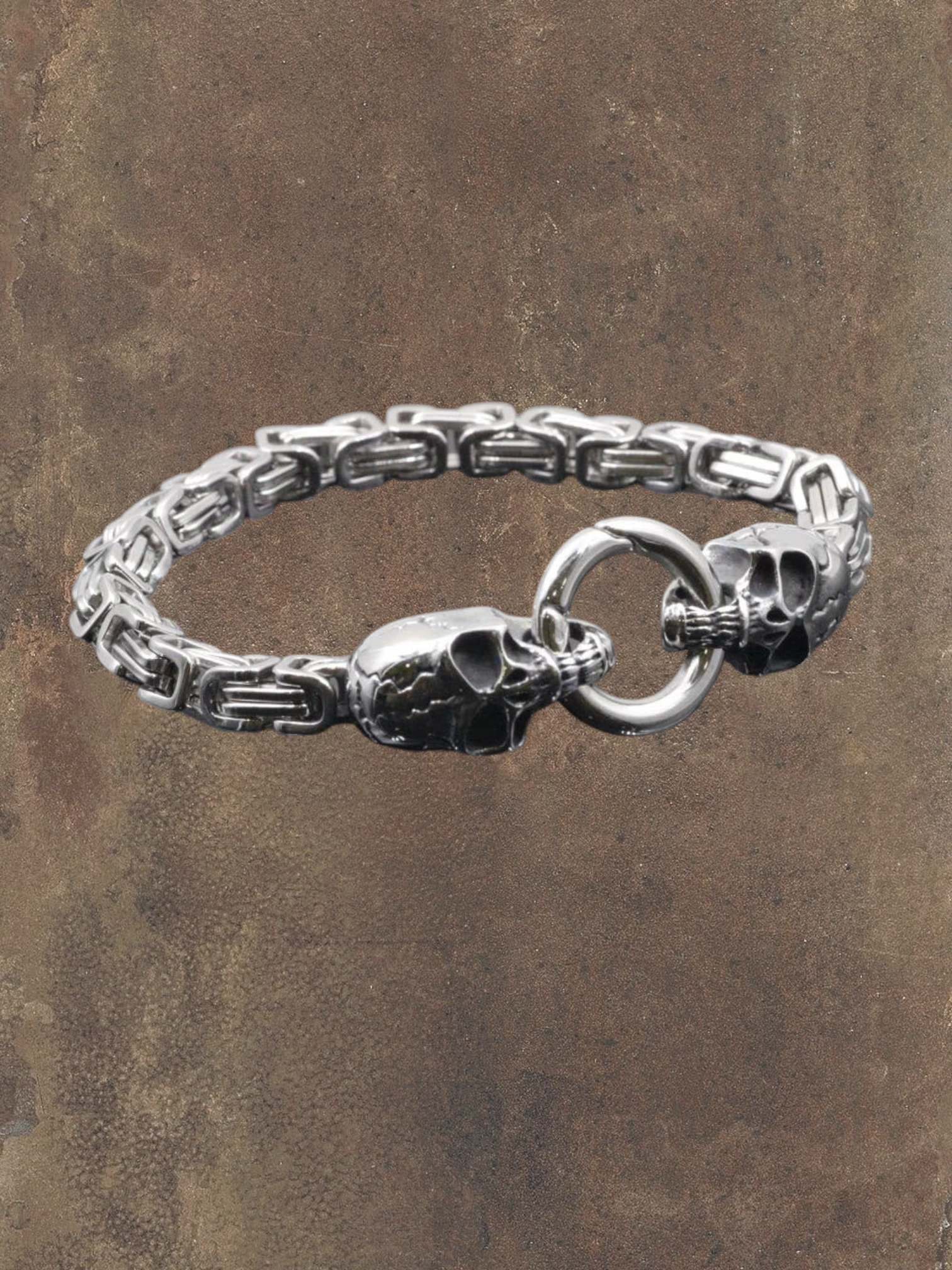 WILDSIDE silver stainless steel skull chain bracelet with toggle clasp. Edgy and durable.