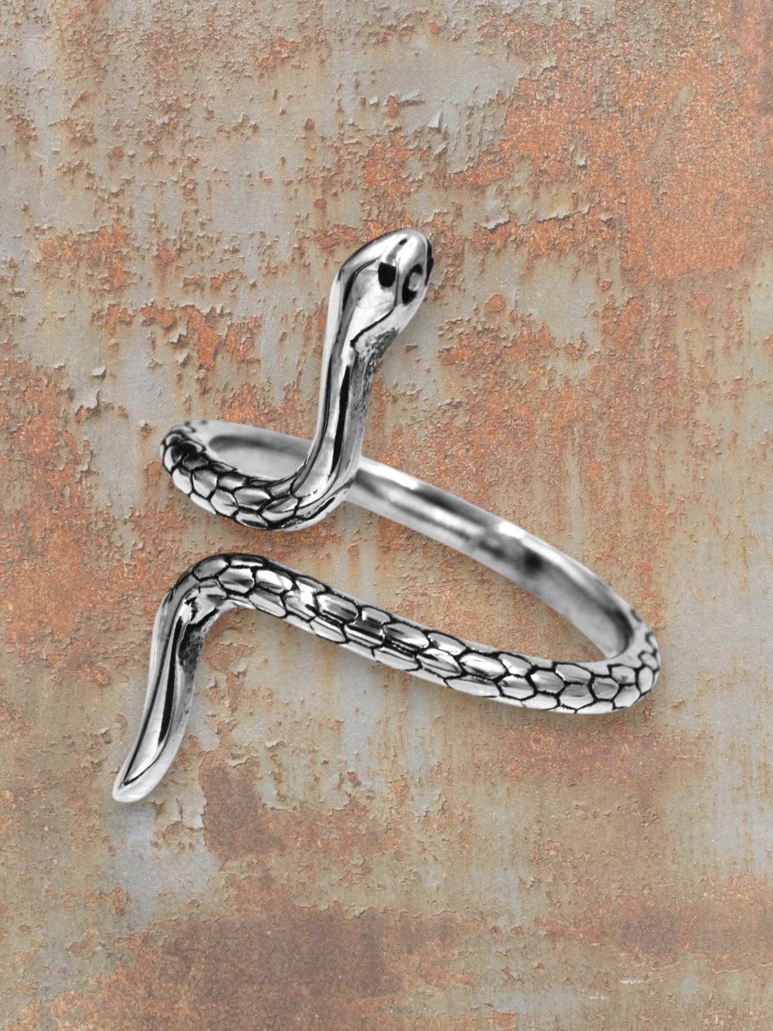 WILDSIDE silver snake ring crafted from polished 316L stainless steel with intricate scale detailing.