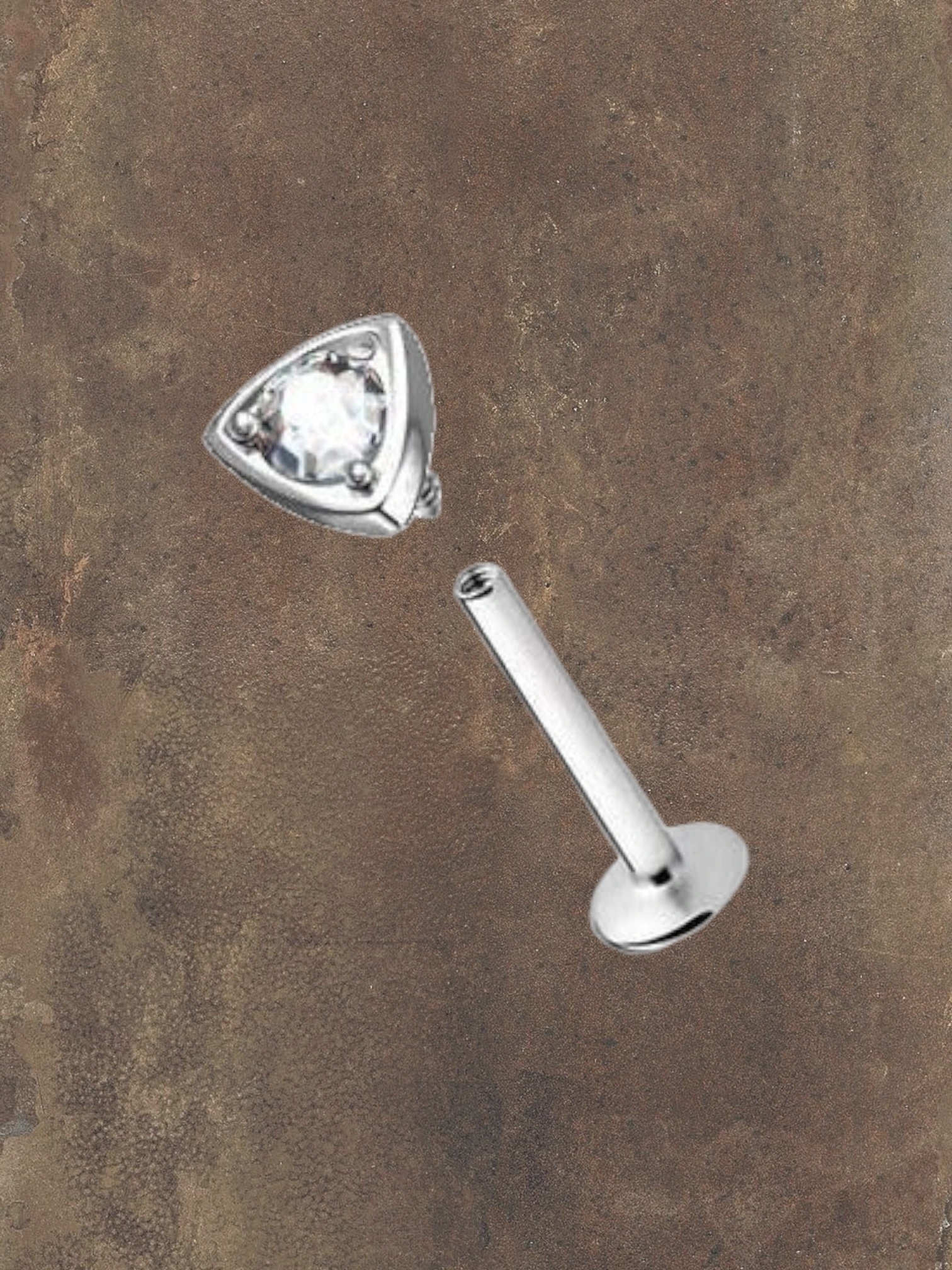 WILDSIDE silver 316L surgical steel labret piercing with a clear crystal in a triangular setting.