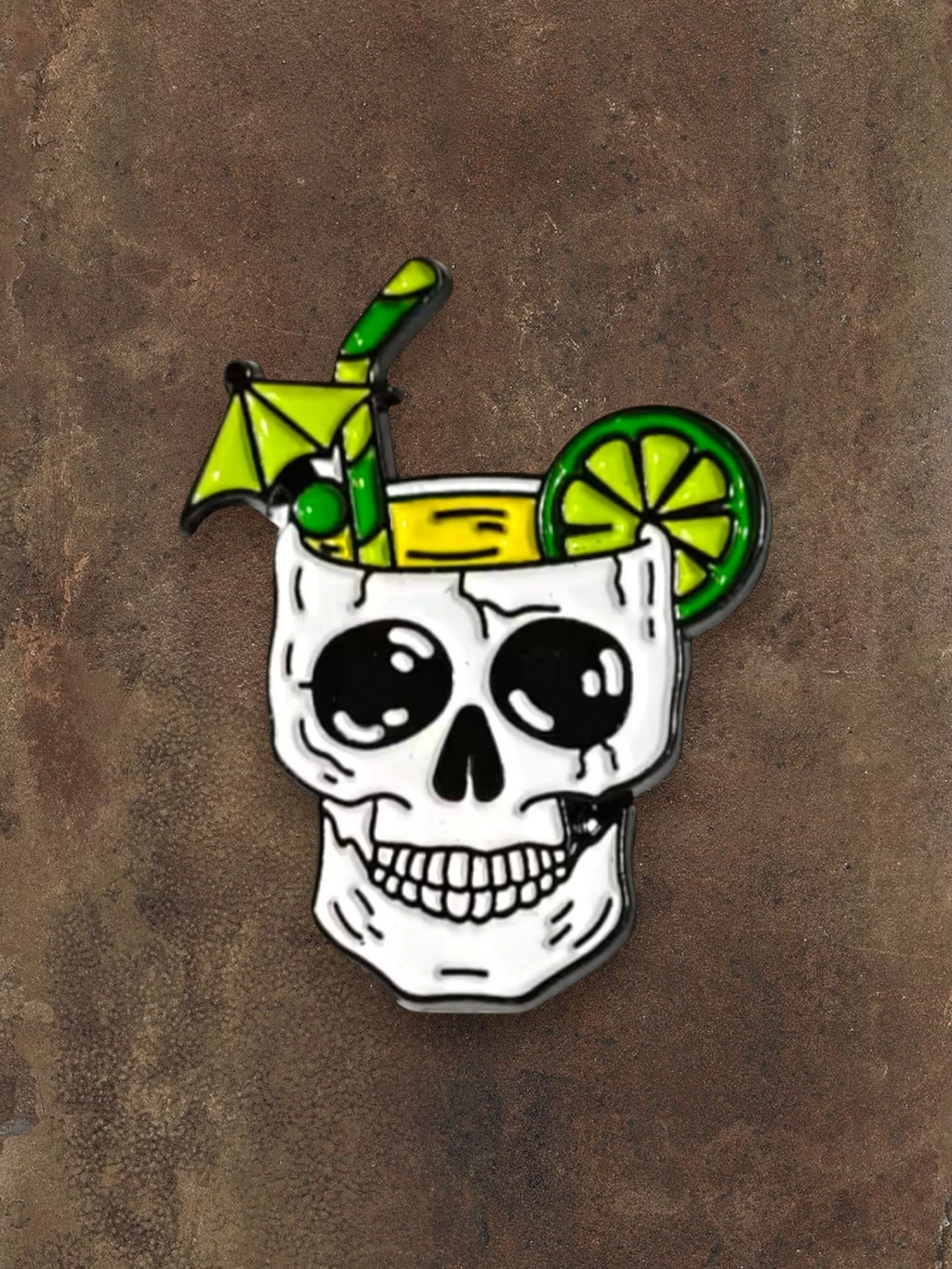 WILDSIDE skull cocktail pin with lime, straw, and umbrella. White enamel with black and green details.
