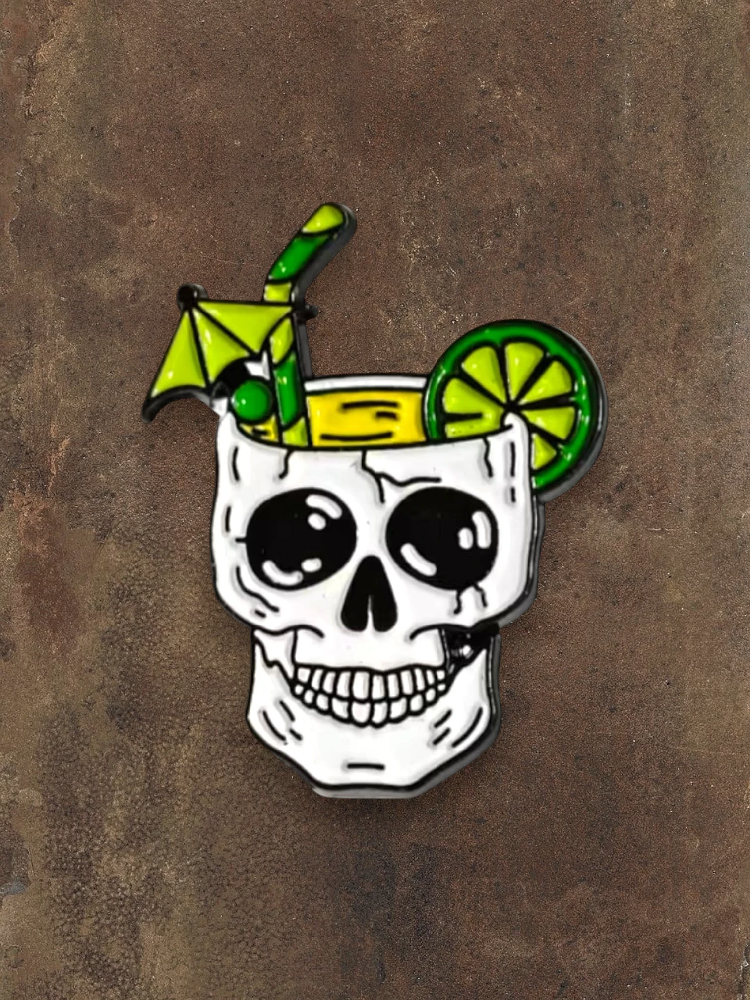 WILDSIDE skull cocktail pin with lime, straw, and umbrella. White enamel with black and green details.
