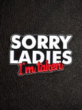 WILDSIDE "Sorry Ladies I'm Taken" enamel pin with white and red text on a black background.