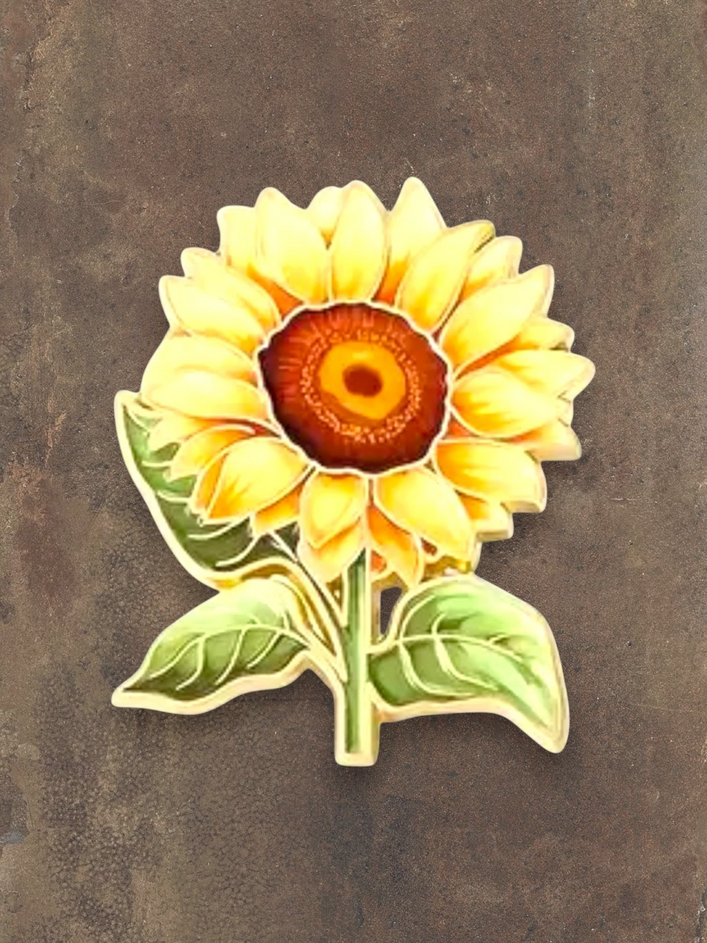 WILDSIDE enamel sunflower pin with yellow petals and green leaves, perfect for jackets and bags.