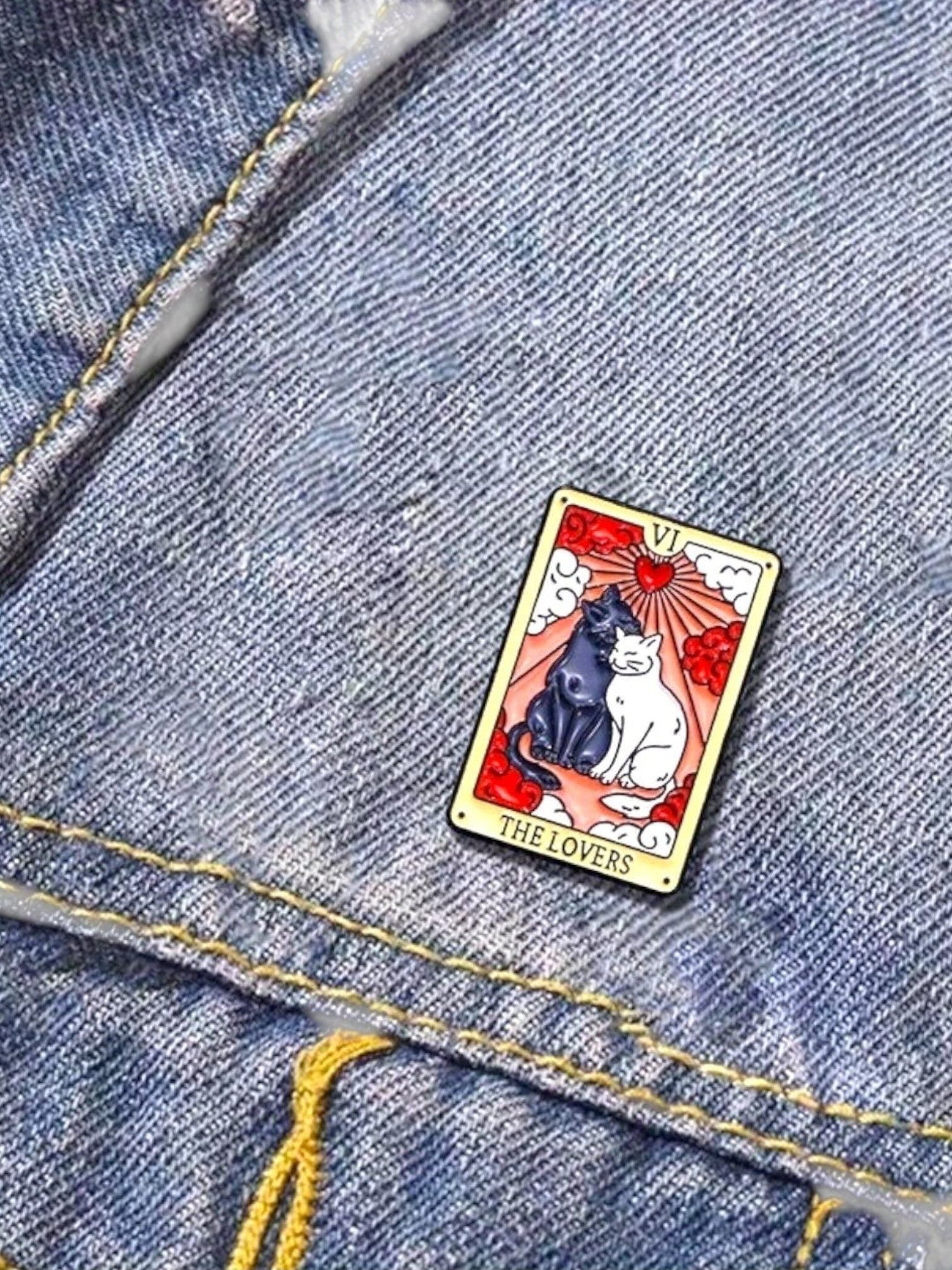 WILDSIDE Tarot The Lovers enamel pin featuring black and white cats sitting together, with a heart and sun design.