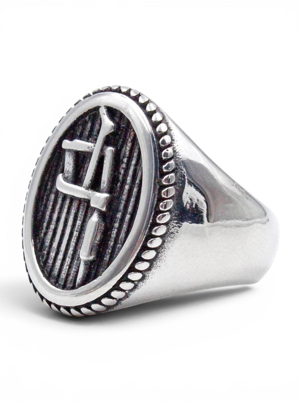 WILDSIDE Tattoo ring crafted from polished 316L stainless steel with an oval face and intricate engraved detailing.