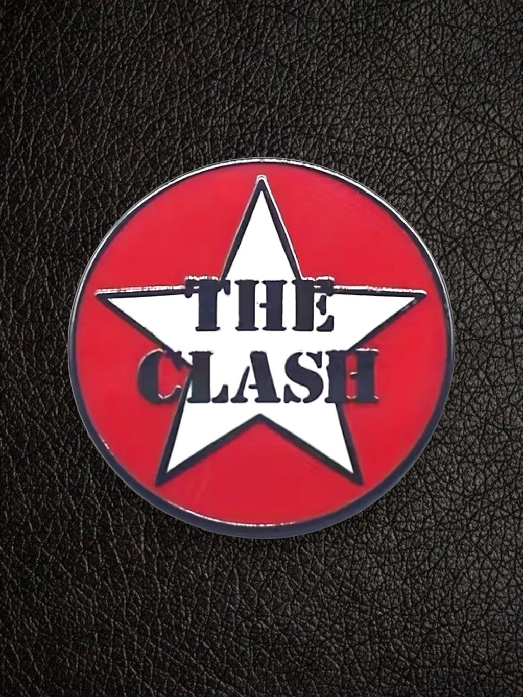 WILDSIDE The Clash red and white star enamel pin with black text, perfect for jackets and bags.