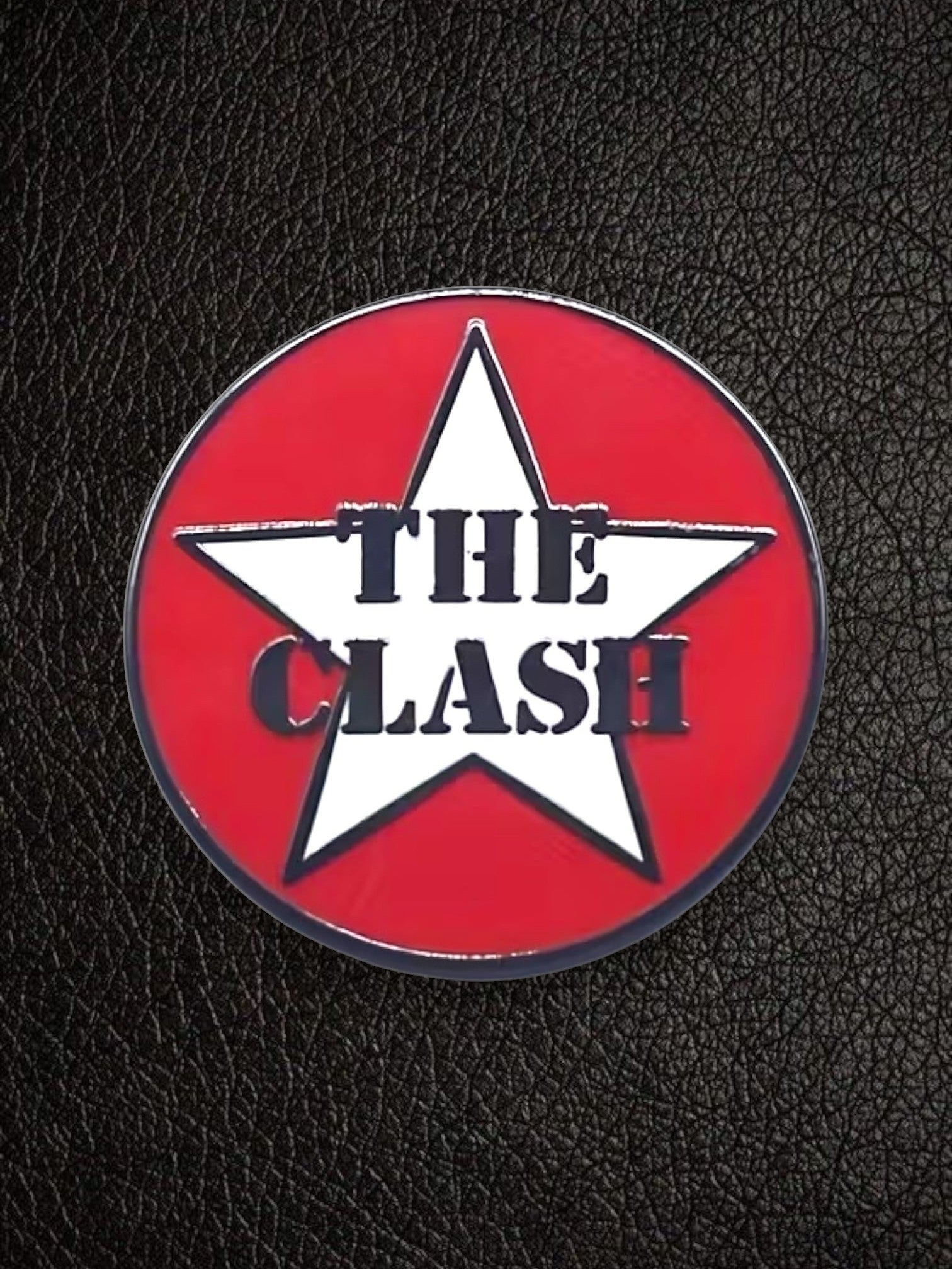 WILDSIDE The Clash red and white star enamel pin with black text, perfect for jackets and bags.