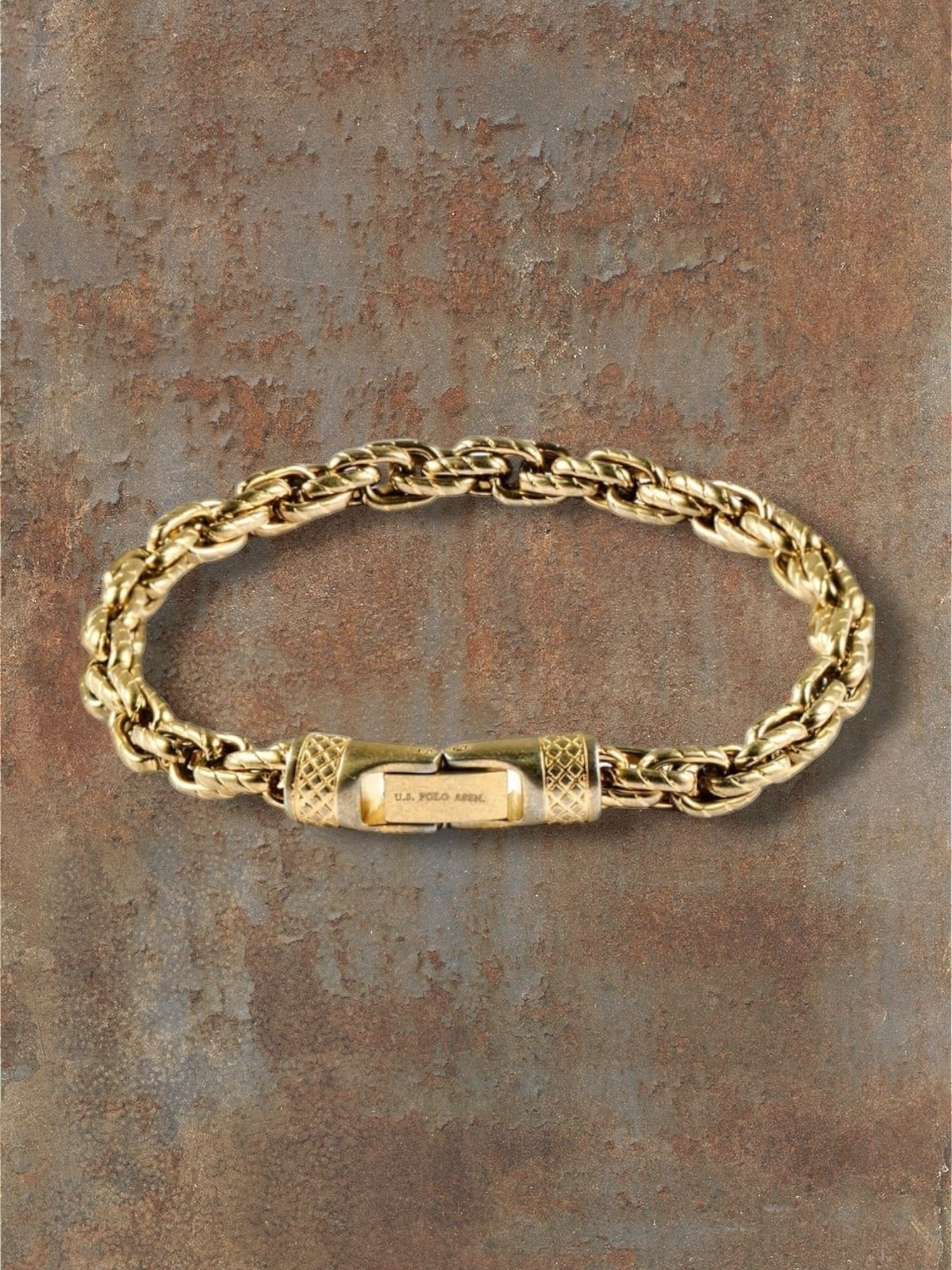 WILDSIDE U.S. Polo Assn. gold-plated stainless steel chain bracelet with an interlocking clasp and logo detail.