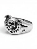 WILDSIDE sterling silver Western skull ring featuring a horseshoe arch with star cutouts and a polished finish.