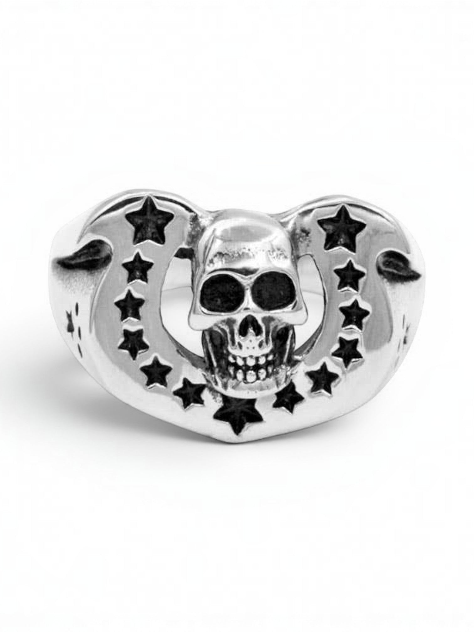 WILDSIDE sterling silver ring featuring a detailed skull emblem framed by a horseshoe arch with star cutouts.