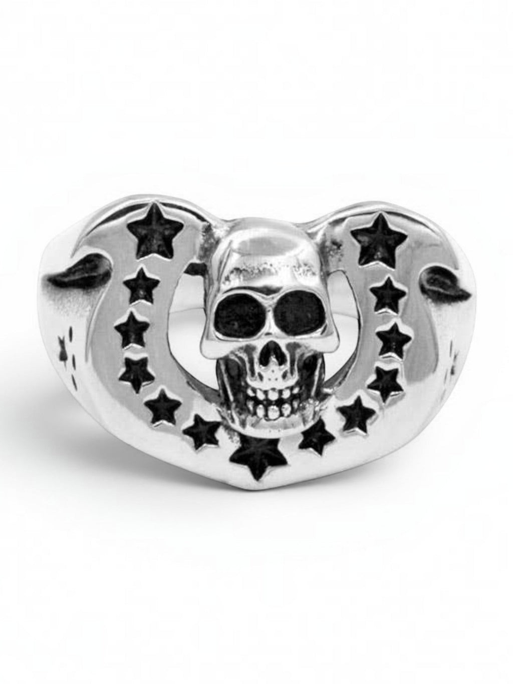 WILDSIDE sterling silver ring featuring a detailed skull emblem framed by a horseshoe arch with star cutouts.