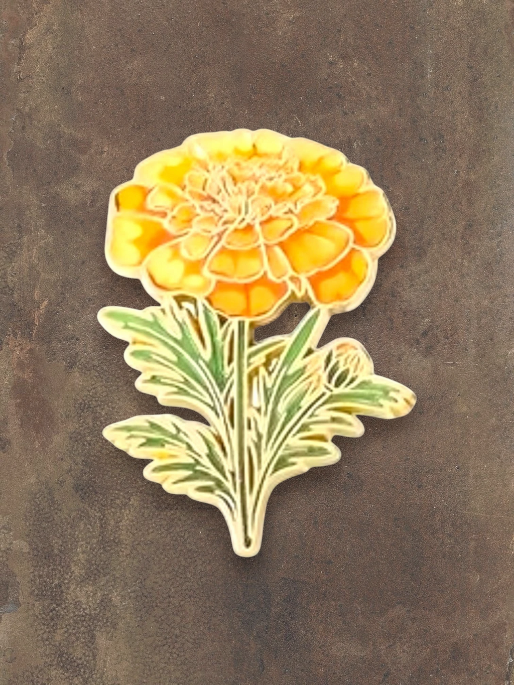 WILDSIDE yellow marigold flower pin with green leaves. Enamel pin for jackets and clothing.